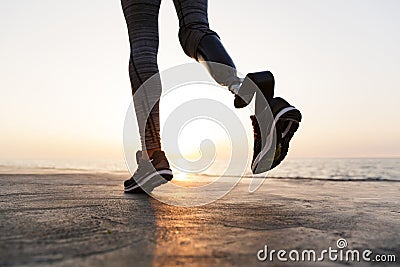 Close up of disabled woman with prosthetic leg Stock Photo