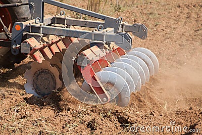 Close up of a disc harrow system, cultivate the soil Stock Photo