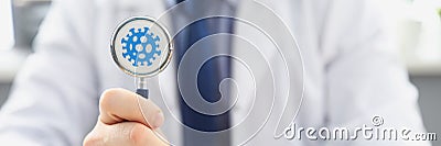 Doctor holding stethoscope infected with coronavirus, determining prognosis disease during pandemic Stock Photo