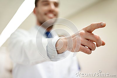 Close up of doctor pointing finger at hospital Stock Photo