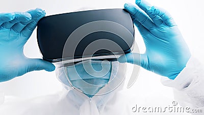 Close up. Doctor using VR glasses to prepare for the surgery. Monitoring patient simulation Stock Photo