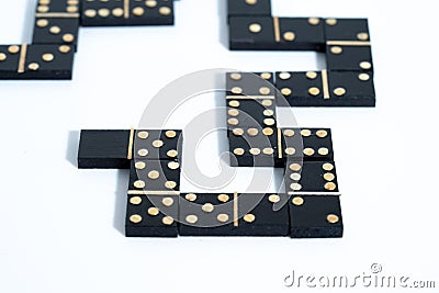 close up of a domino game with black blocks Stock Photo