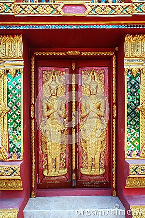 close up doors bass-relief in Beautiful temple Wat Samai Kongka on Ko Pha Ngan, Thailand. Stock Photo