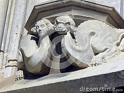 Close-up of a Dragon- and humanlike ornament. Stock Photo