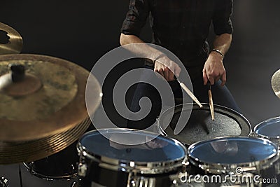 Close Up Of Drummer Playing Snare Drum On Kit In Studio Stock Photo