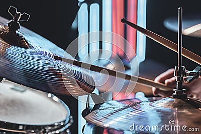 Close up the drummer plays drums with drum sticks Stock Photo
