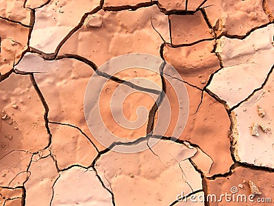 Close up of dry cracked mud on a hot day Stock Photo