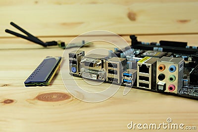 Close up dvi,vga,USB 3.0, HDMI and various connection ports of Computer motherboards On wooden Stock Photo