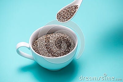 Close-up of ealthy chia seeds in a spoon. Text space. Stock Photo