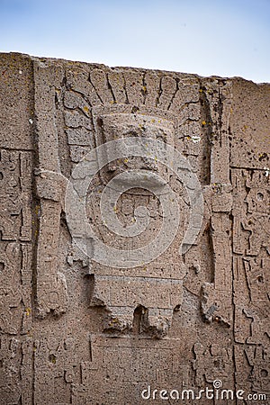 Close-up of elaborate stone carvings and reliefs on the Puerta de Sol Gateway of the Sun, at the Tiwanaku archeological site, Editorial Stock Photo
