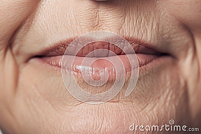 Close up of elderly woman's wrinkles around mouth Stock Photo