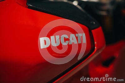 Emblem of Ducati on a sport red motorcycle. Editorial Stock Photo