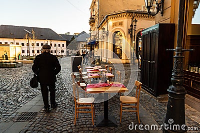 Close up of an empty tables with empty chairs at a local outdoor resturant in Bucharest, Romania, 2021 Editorial Stock Photo