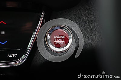 Close up engine car start button. Start stop engine modern new car button Stock Photo