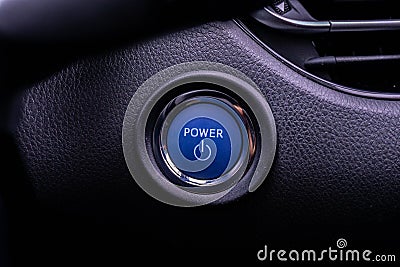 Close up engine car start button. Start stop engine modern new car button Stock Photo