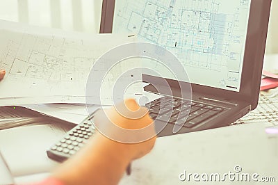 Close up of engineers hands working on table, he drawing project sketch in construction site or office Stock Photo