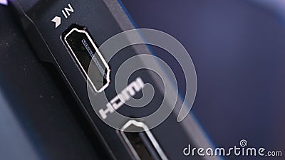 Close up of the external power and HDMI connector. Action. Side view of a computer or laptop device, modern technologies Editorial Stock Photo