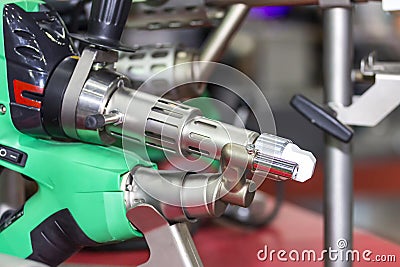 Close up extruder plastic welding machine for industrial repair and maintenance Stock Photo