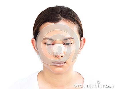 Close up face of asian woman with nose plastic surgery for beauty and cosmetic conept, white background Stock Photo