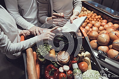 Close up Family in Supermarket in Fruit Department Stock Photo