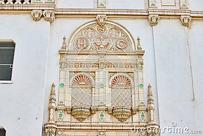 Close up of fancy golden and pastel green elaborate wall of city hall building in San Francisco Stock Photo
