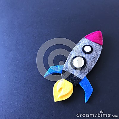 Felted Toy Rocket Spaceship Close Up on Black Stock Photo