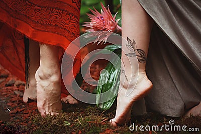 Close up female feet with tattoo concept photo Stock Photo