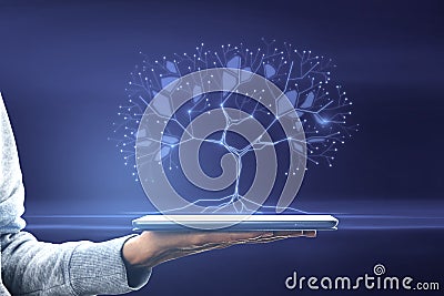 Close up of female hand holding tablet with abstract digital tree on background. Big data and network connection concept Stock Photo