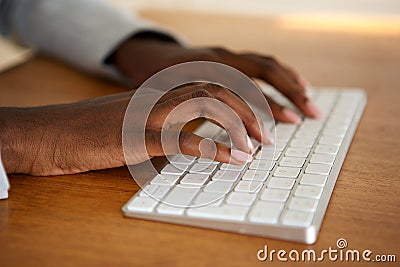 Close up female hands typing on computer keyboard Stock Photo