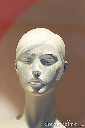 Close-up of a female plastic mannequin head with a pretty face Stock Photo