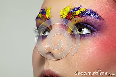 Close-up female portrait with unusual face art make-up Stock Photo