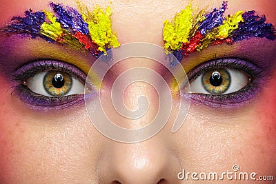 Close-up female portrait with unusual face art make-up and freckles Stock Photo