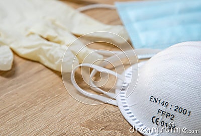 Close up of FFP2 mask and disposable gloves Stock Photo