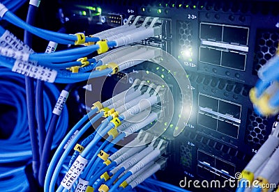 Close up fiber optic cable. Servers racks Stock Photo