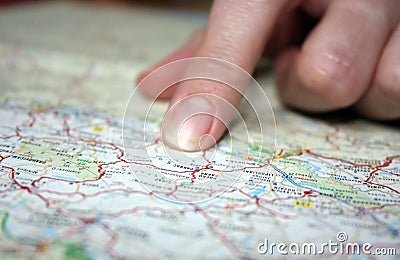 Close-up of finger on map Stock Photo