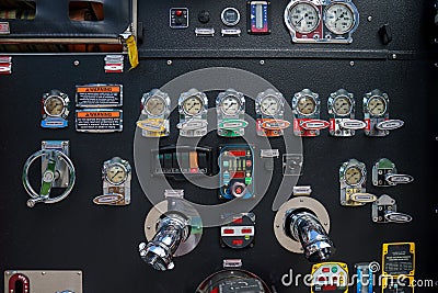 Close-up fire truck equipment detail. Fire control panel, dials and dashboard Stock Photo