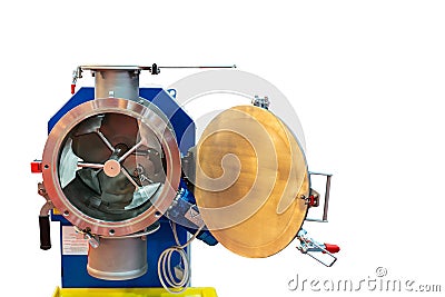 Close up flat beater and fly cutter inside barrel of high technology commercial mixer machine multipurpose type for industrial Stock Photo