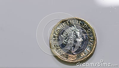 Close up focus photos of new United kingdom Pound coin isolated on a white background Editorial Stock Photo