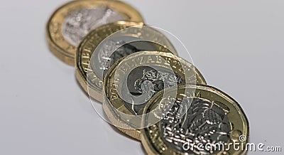 Close up focus photos of new United kingdom Pound coin isolated on a white background Editorial Stock Photo