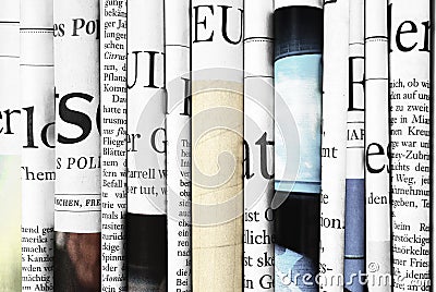 Close-up of folded newspapers Stock Photo