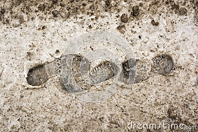 Close up of footprints in the dirty snow Stock Photo