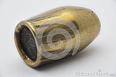 Close up, Forensics ballistics rifling marks on bullet also known as land impressions and groove impressions, white background. Hi Stock Photo