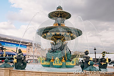 Fountain of River Commerce and Navigation in Place de la Concorde in the center of Paris France, on a summer day, with drops of Editorial Stock Photo