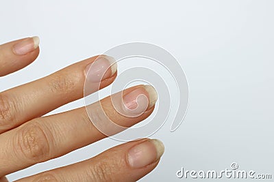 four dirty hand nails on white background Stock Photo