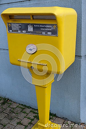 French post office letterbox in a street in Vannes in Brittany Editorial Stock Photo