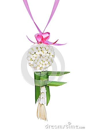 Fresh jasmine garland with green pandan leaves interlace in fish shape and magnolia champaca flower hanging isolated on white Stock Photo