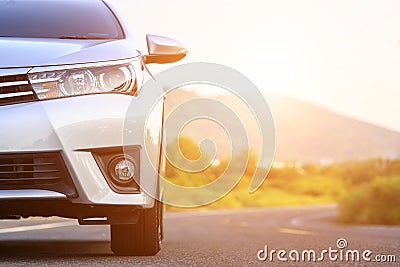 Front of new silver car parking on the asphalt road Stock Photo