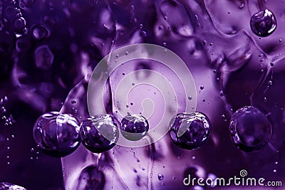 Close-up of frozen bubbles in an ice block in ultra violet Stock Photo