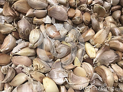 Close up garlic cloves on market for cooking Stock Photo