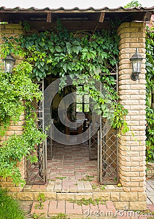 Close-up of gazebo with stylish garden furniture Stock Photo